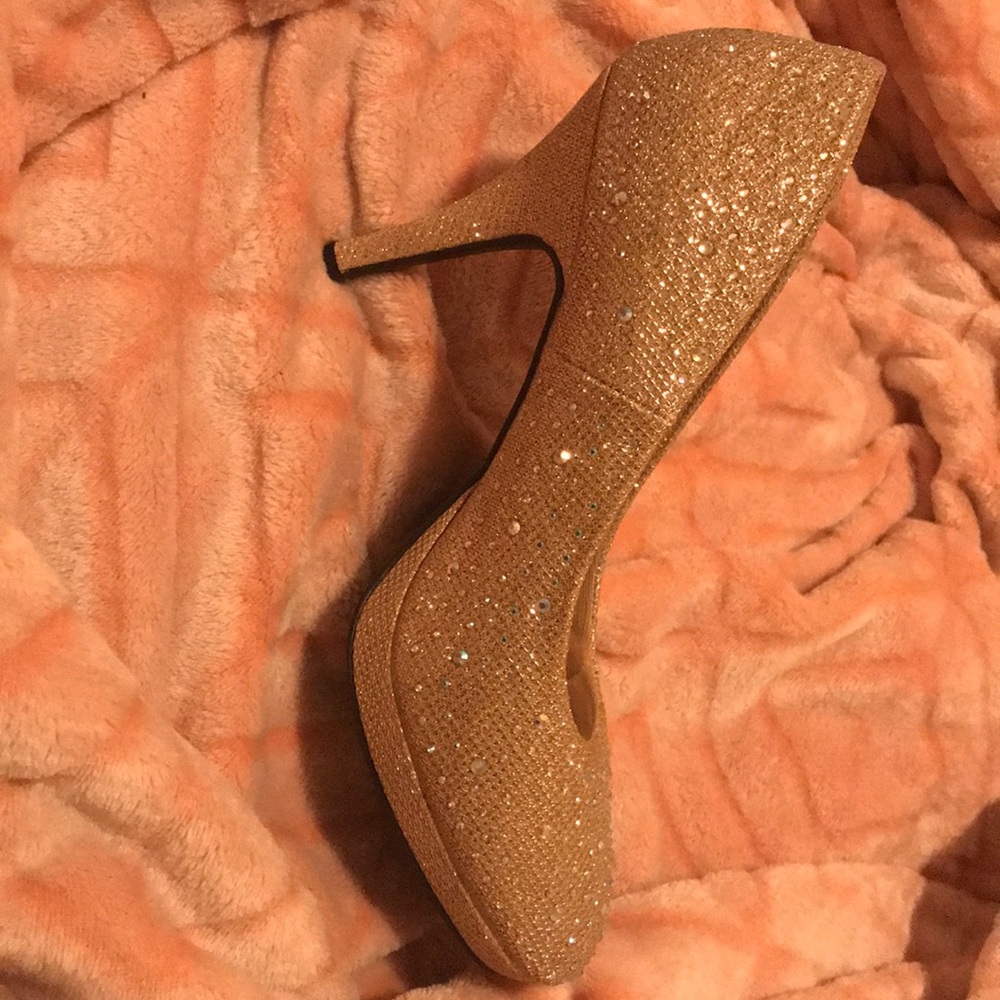 Gold sparkly high heels